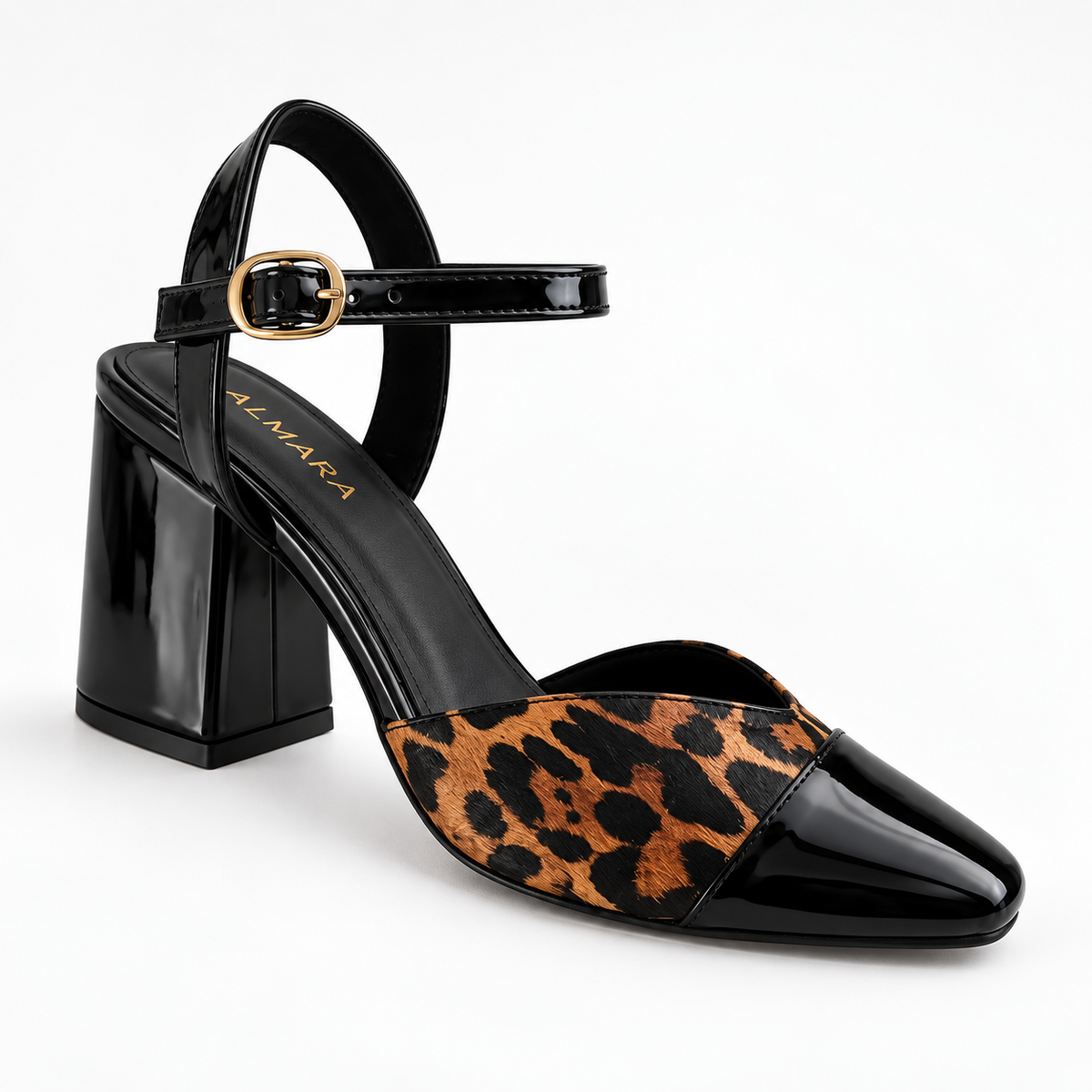 Tacones Carmen de animal print y punta charol
