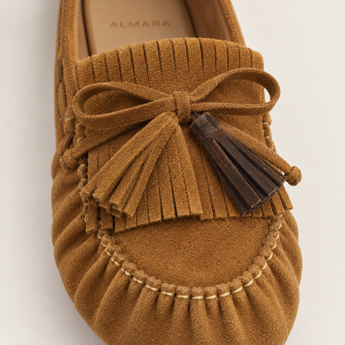 Mocasines Firenze en carnaza con flecos y lazo