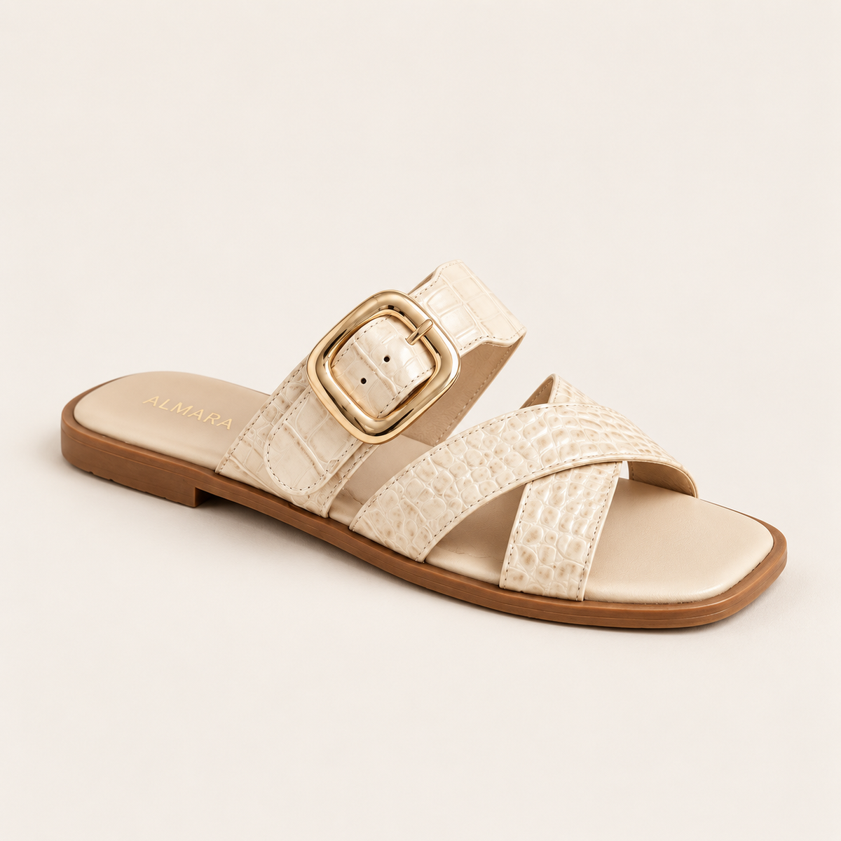 Sandalias planas Berenice con hebilla central dorada